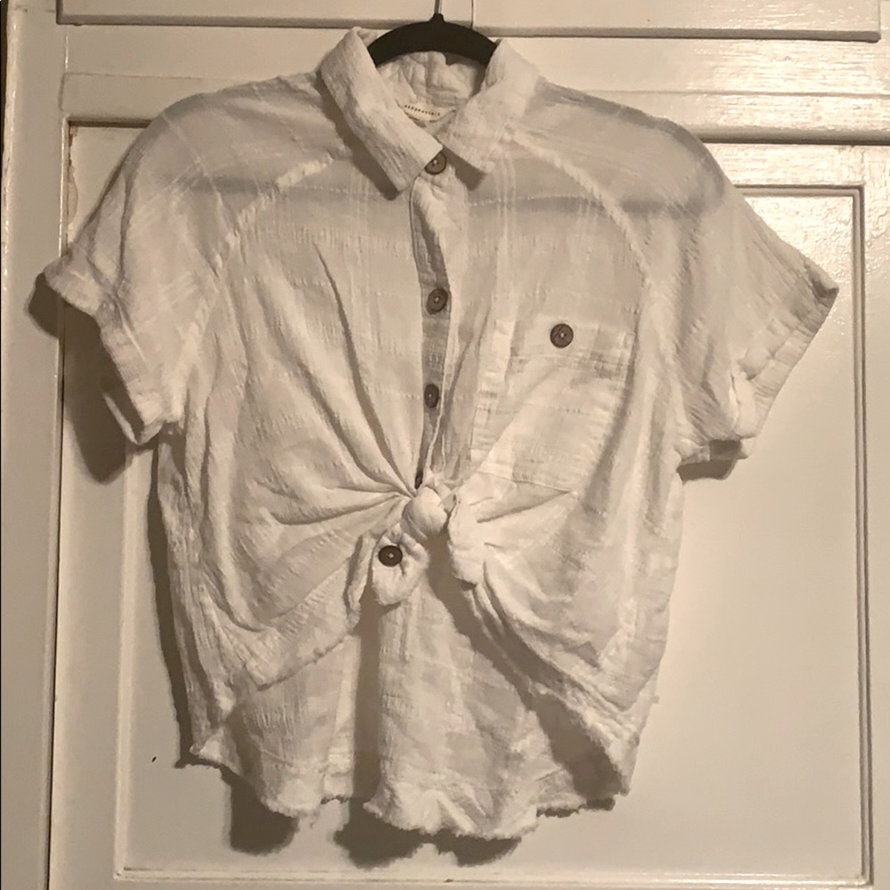 White collared button down short sleeve top